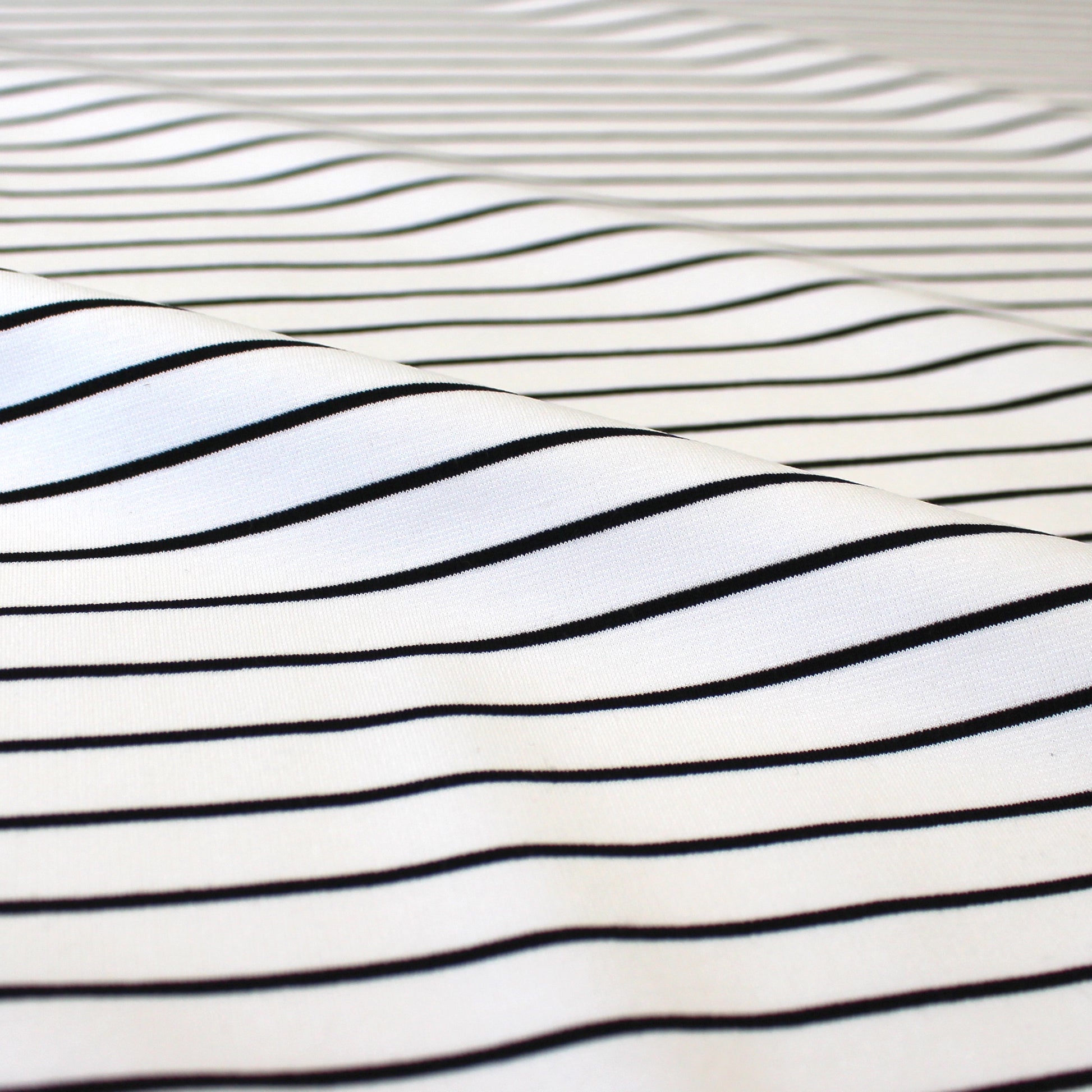 4-way stretch ponte - creamy white/black