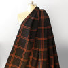 Italian windowpane plaid wool twill suiting - persimmon/black