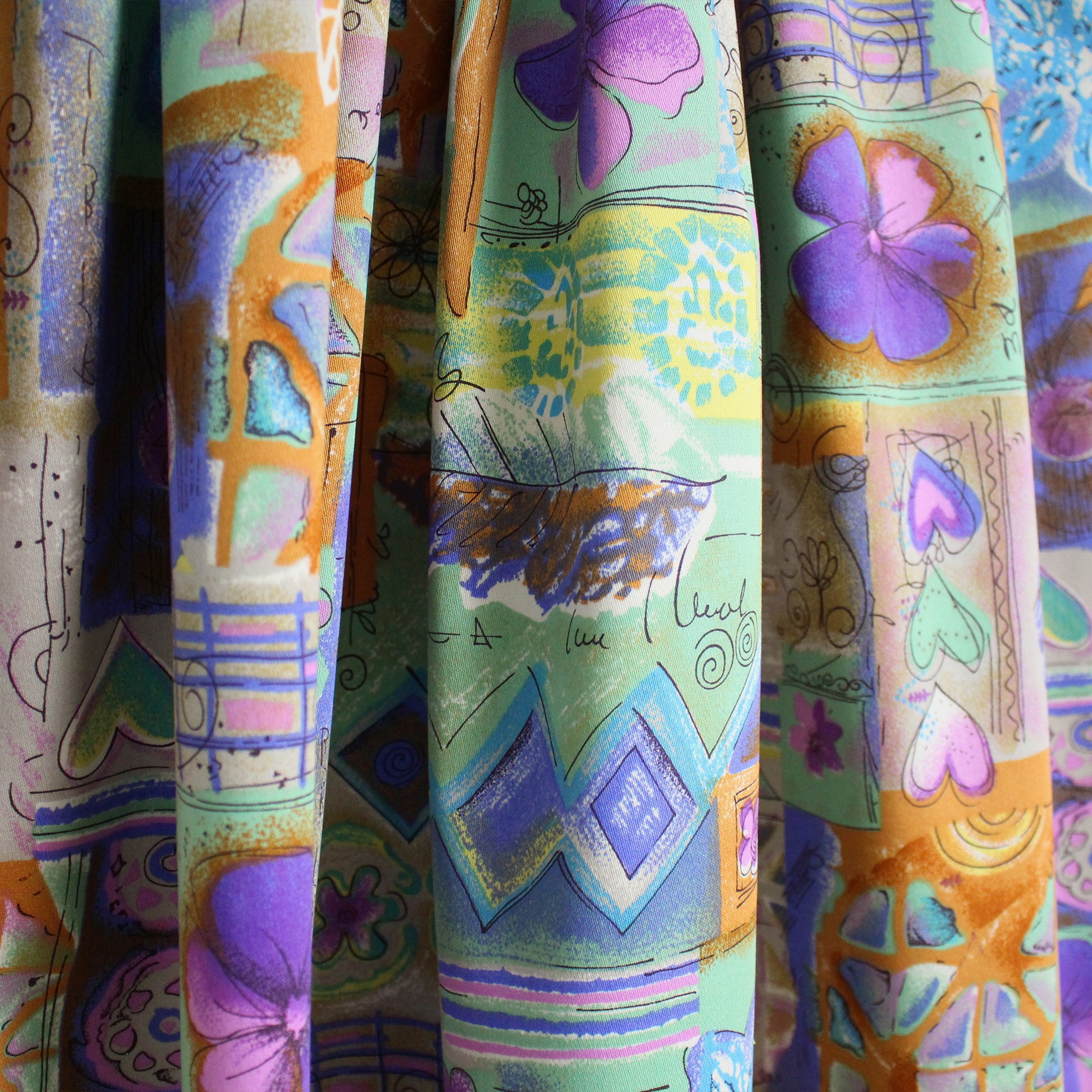 Japanese 'patchwork story' printed stretch denim