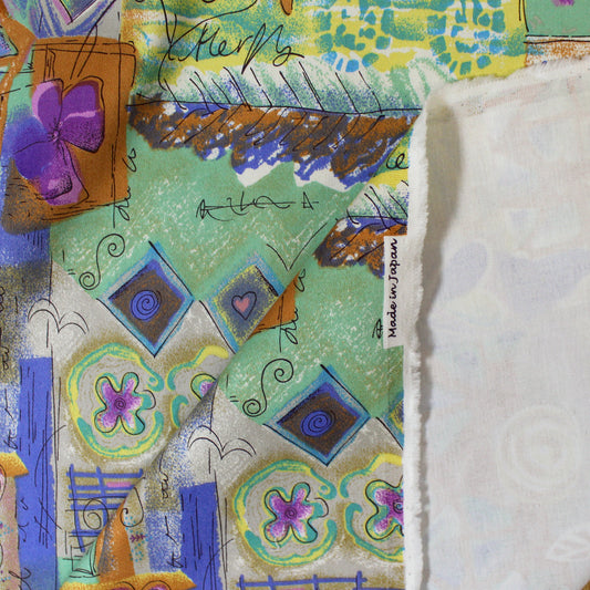 Japanese 'patchwork story' printed stretch denim