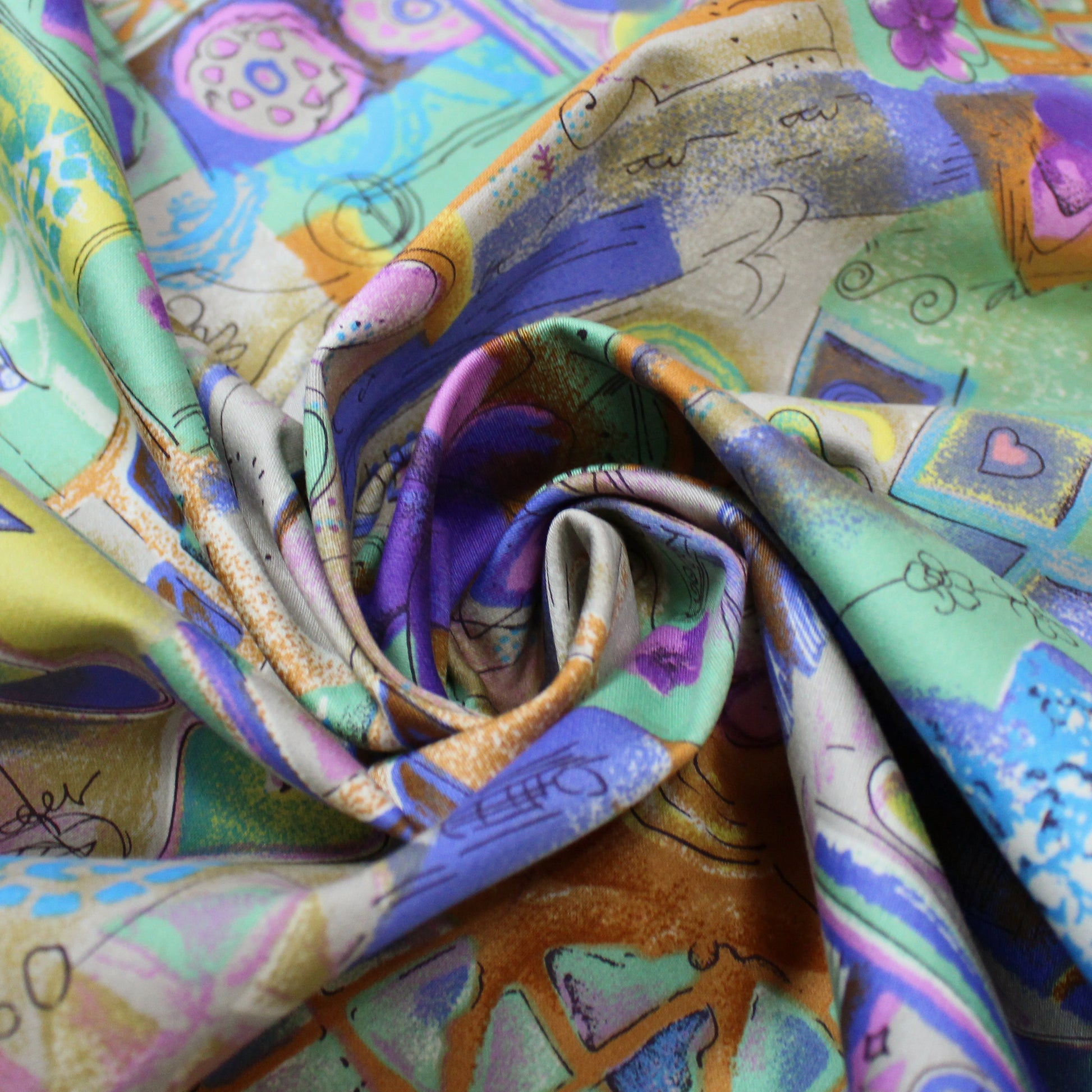 Japanese 'patchwork story' printed stretch denim