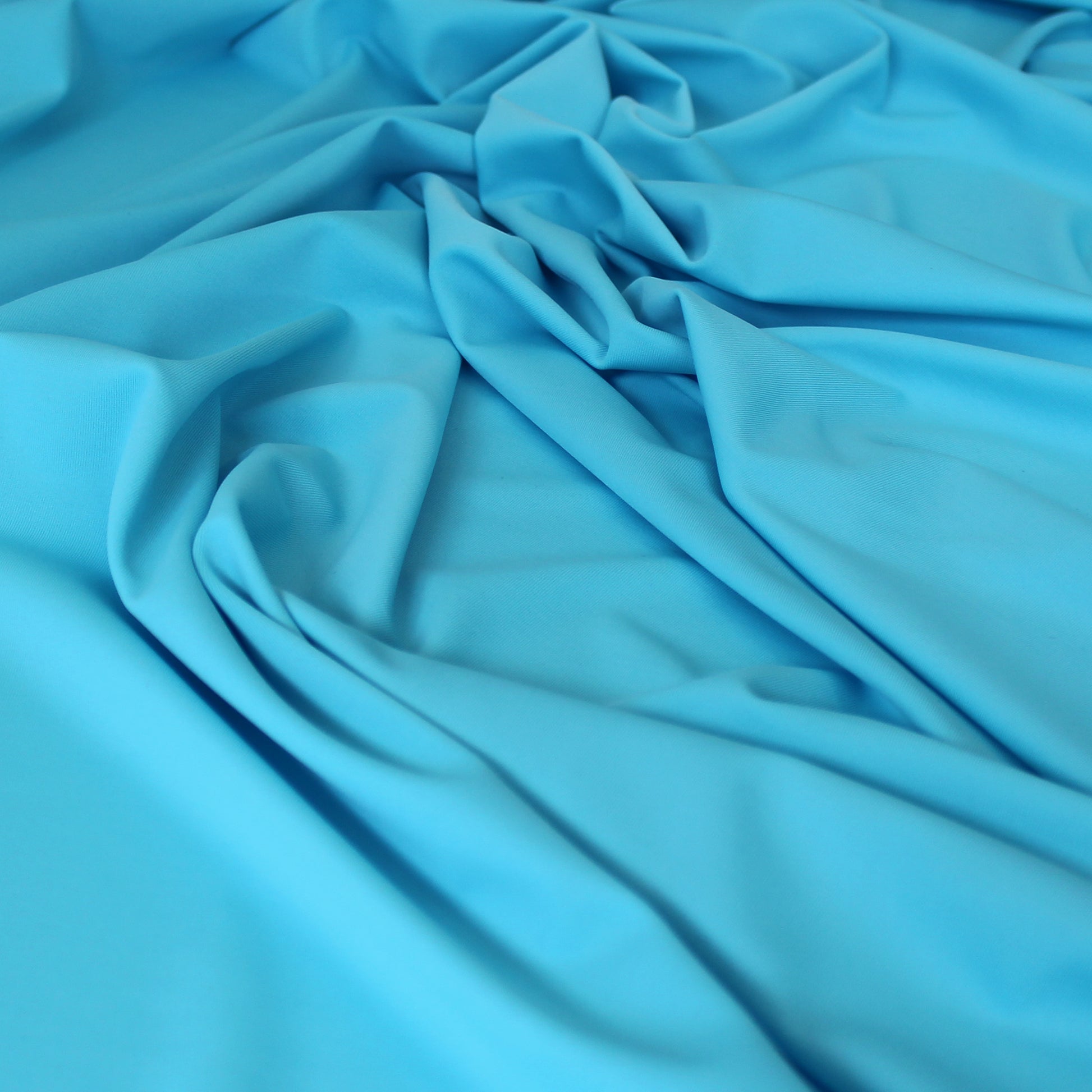 essential 4-way swim knit - sky blue