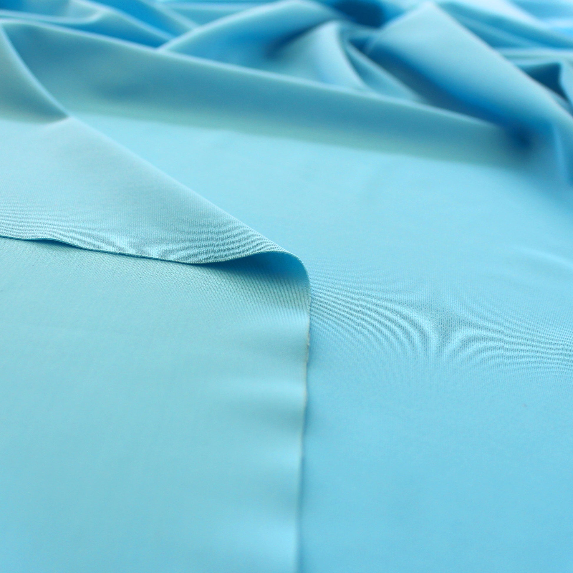 essential 4-way swim knit - sky blue