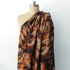 viscose woven, printed 'reflection of leaves' - spice