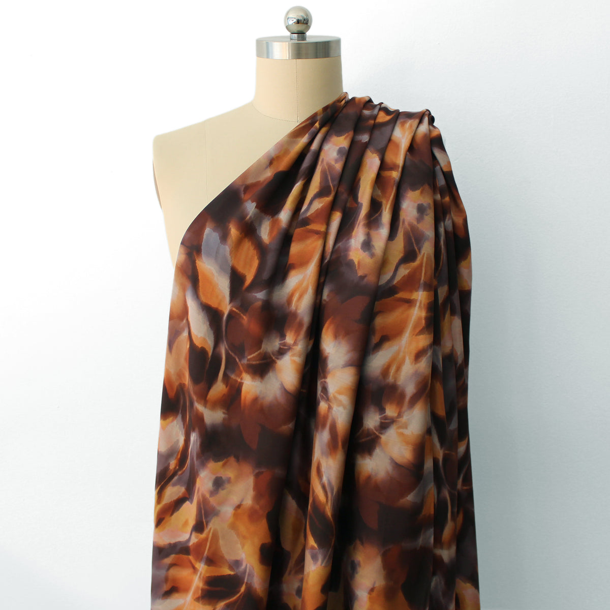 viscose woven, printed 'reflection of leaves' - spice