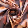 viscose woven, printed 'reflection of leaves' - spice