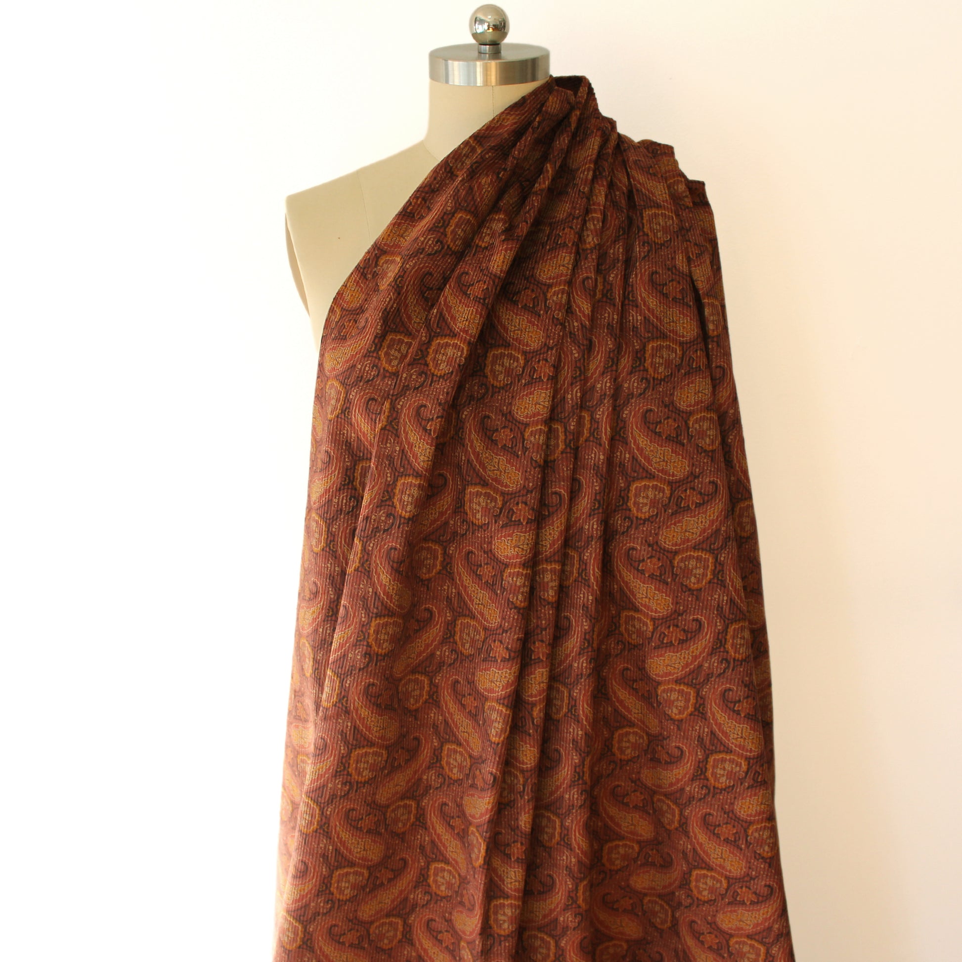 Japanese 'wide wale' paisley stretch cotton corduroy - mulled wine