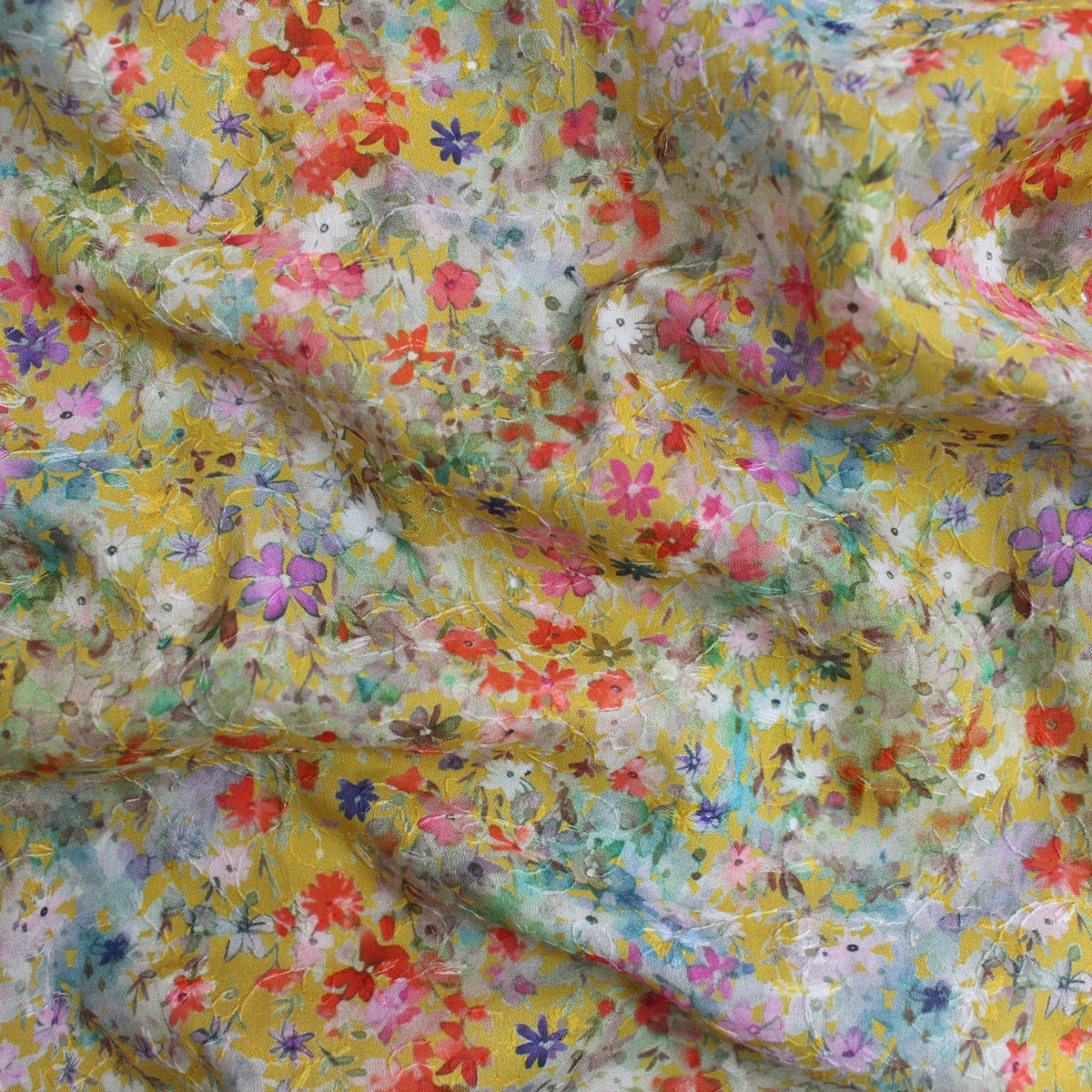 lawn, cotton overprinted embroidered eyelet 'wildflower sun'