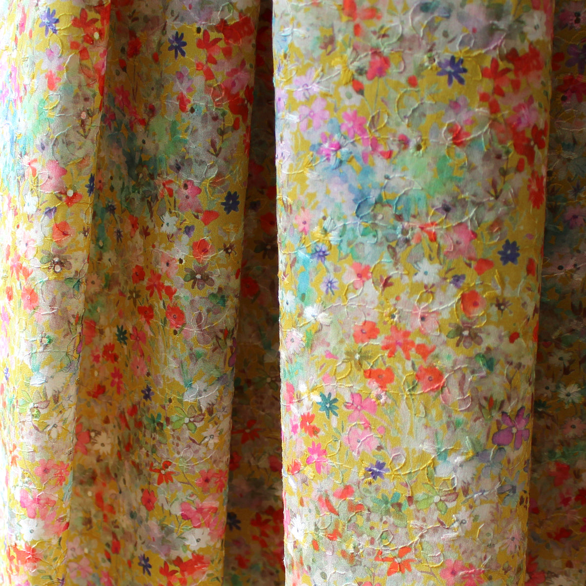 lawn, cotton overprinted embroidered eyelet 'wildflower sun'
