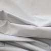 canvas, cotton mid-weight and firm - white