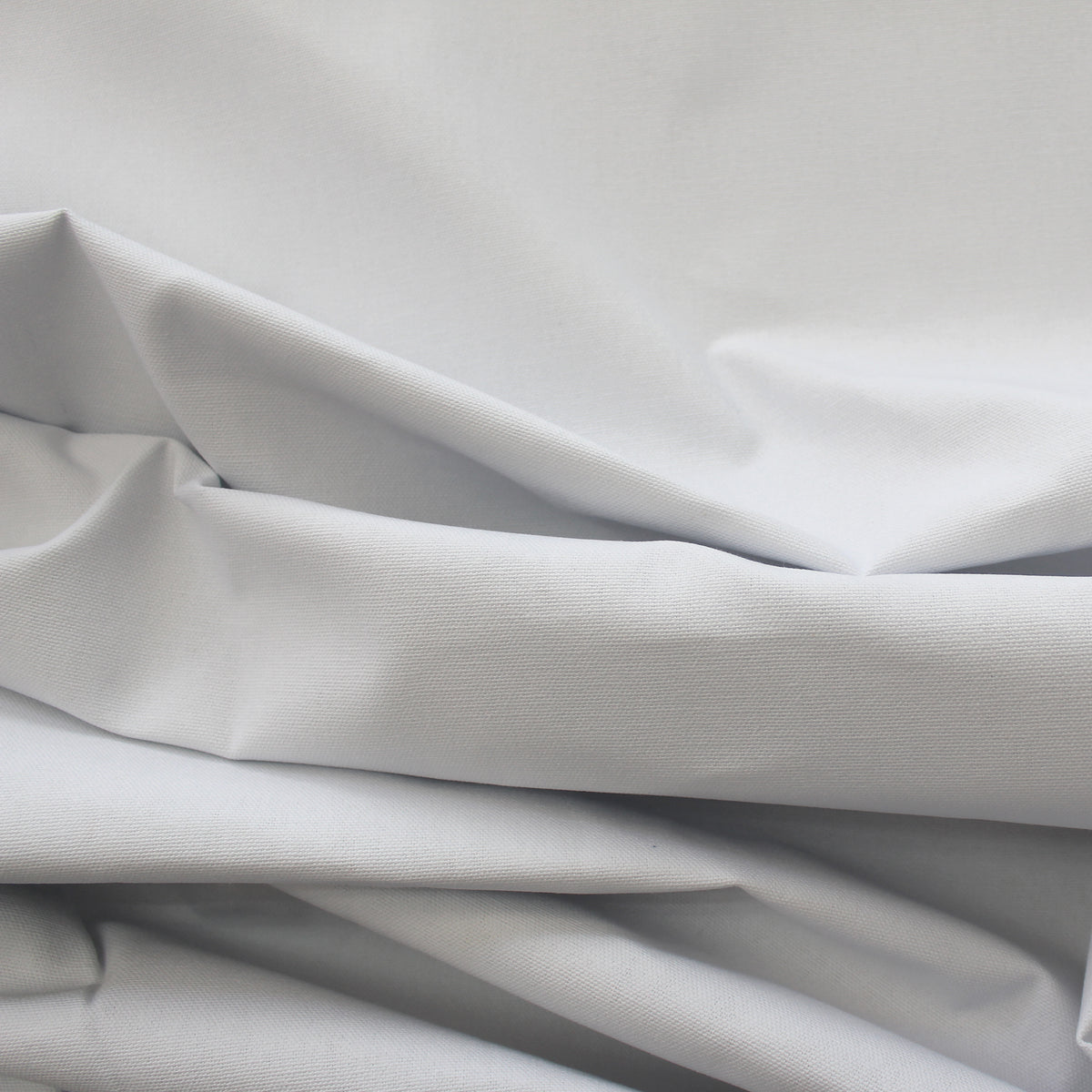 canvas, cotton mid-weight and firm - white