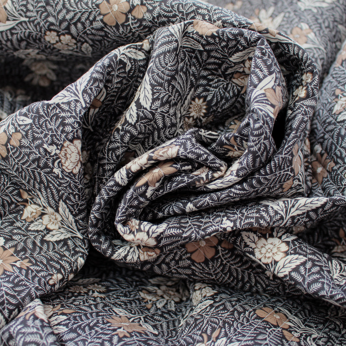 quilted coating, cotton face pre-quilted and lined 