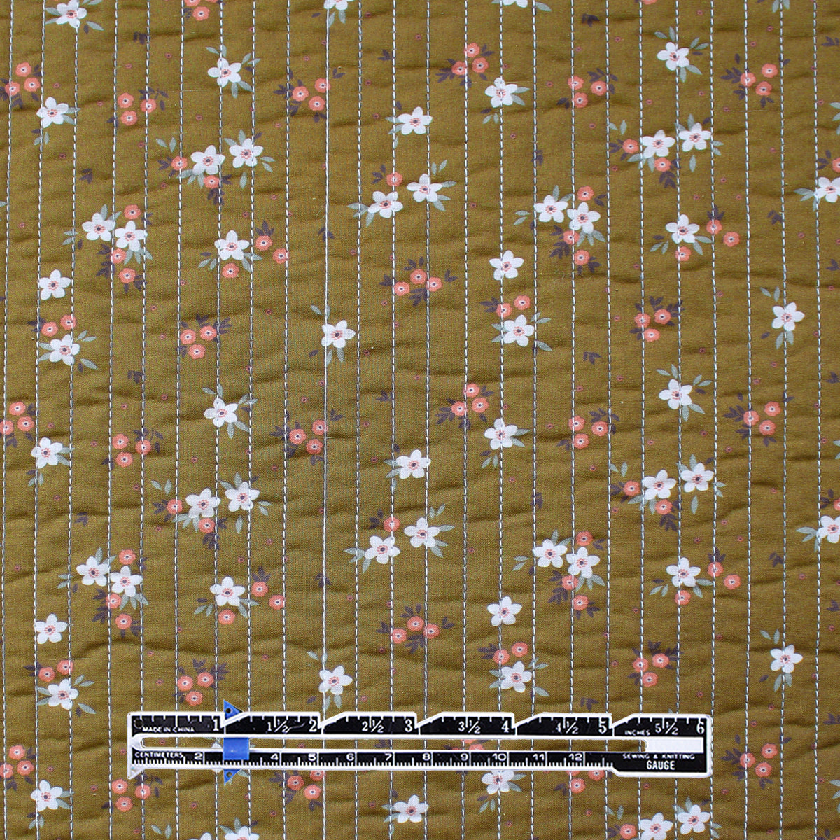 quilted coating, cotton face pre-quilted and lined 