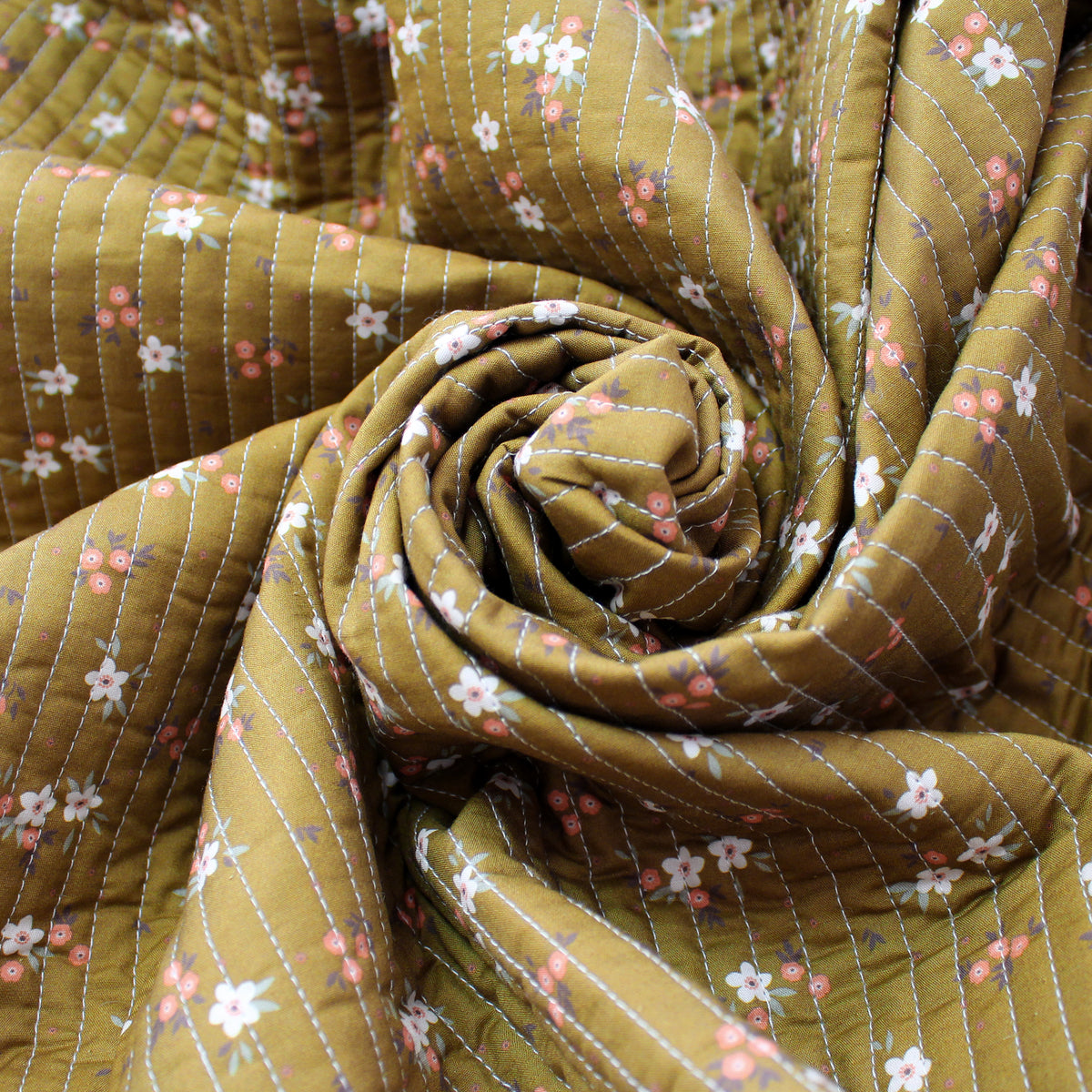 quilted coating, cotton face pre-quilted and lined 