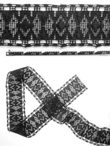 Anna S. black crochet design banded trim