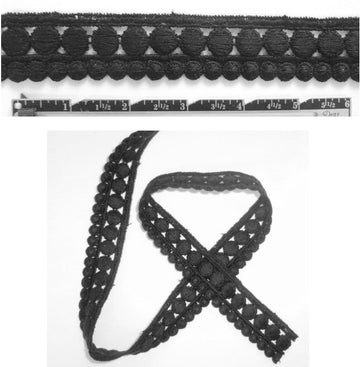 Anna S. black dotty design banded trim
