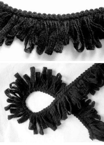 Anna S. black wool sweater loops design fringe
