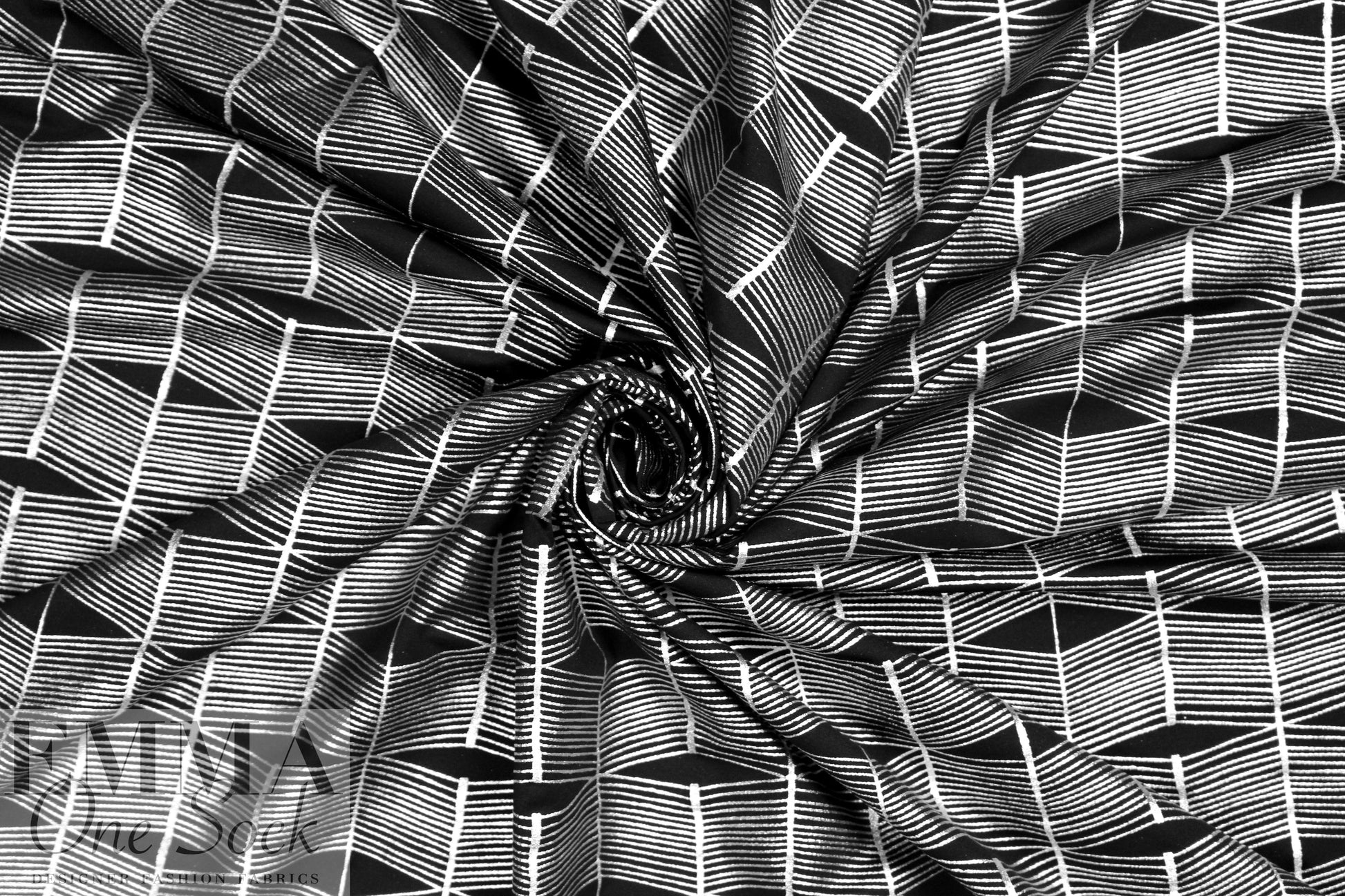 black/silver metallic 'painted 3-D' nylon/spandex knit  1.66 yd