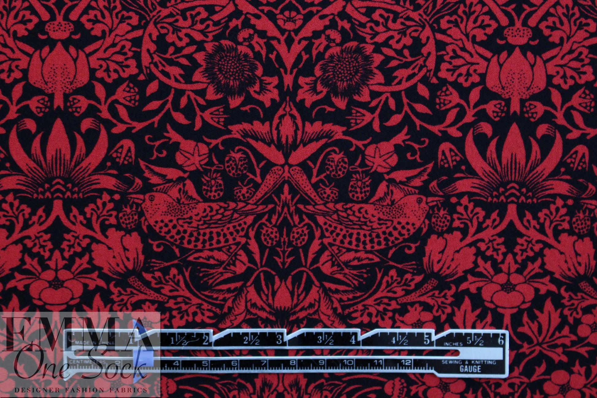 NY designer red/black filigree viscose crepe backed woven