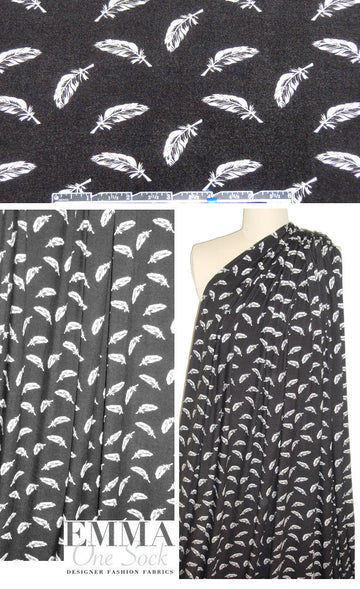floating feathers bamboo/spandex jersey - black/white .875 yds