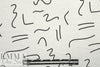 squiggles on white bamboo/spandex jersey - Oeko-Tex cert. .5 yds