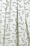 squiggles on white bamboo/spandex jersey - Oeko-Tex cert. 1 yard