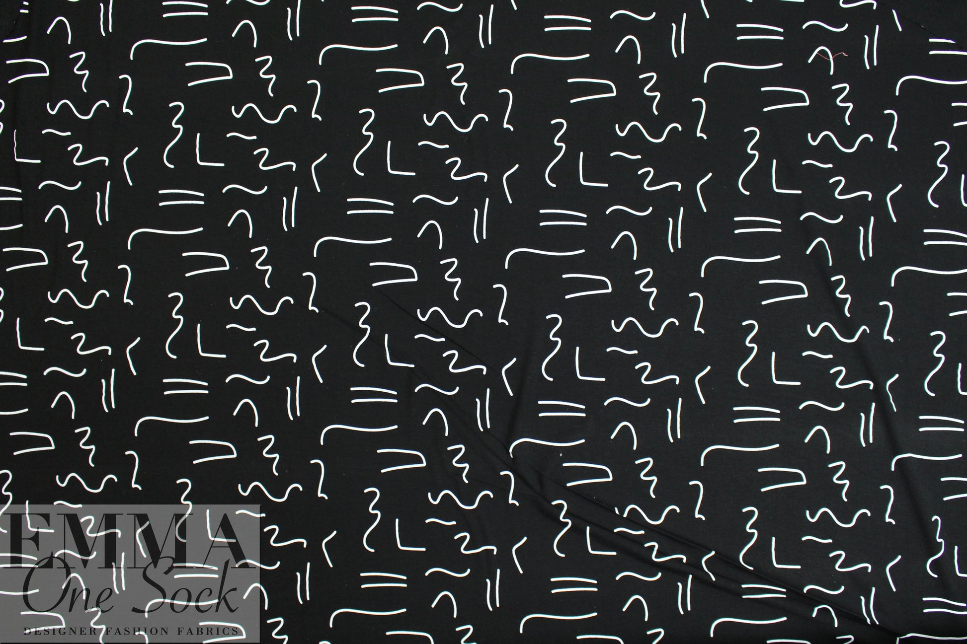 squiggles on black bamboo/spandex jersey - Oeko-Tex cert. .875 yds