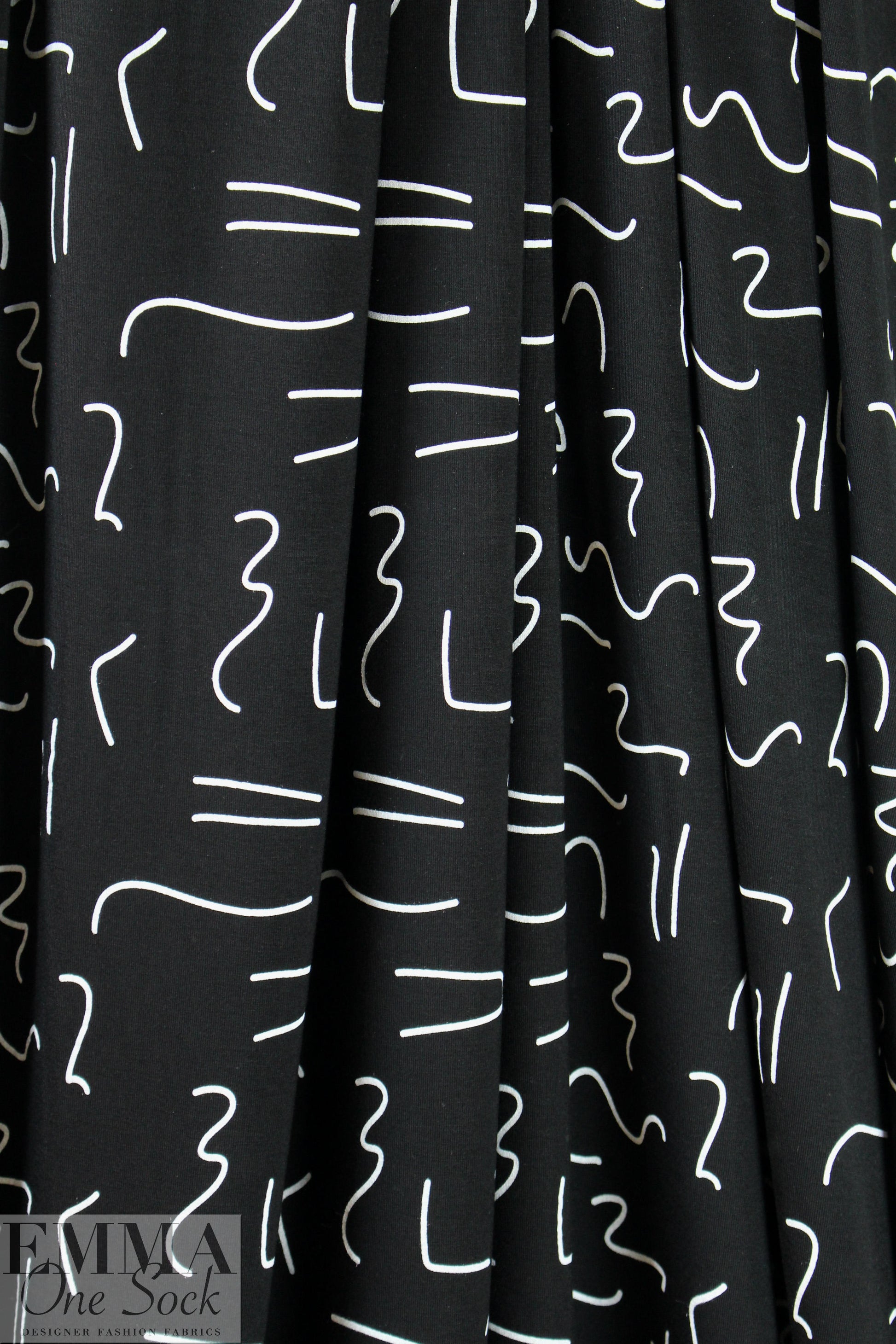 squiggles on black bamboo/spandex jersey - Oeko-Tex cert. .5 yds