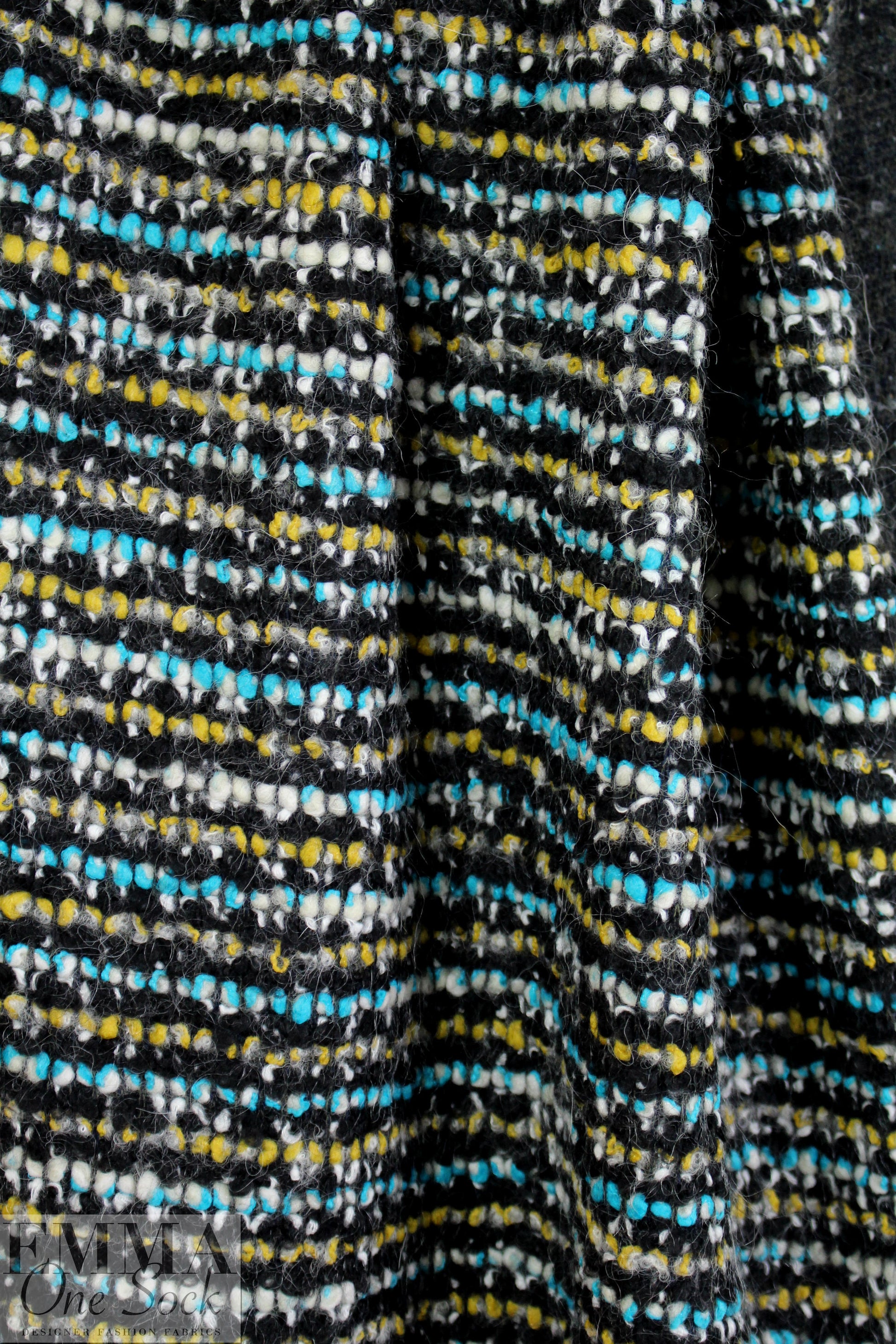 Italian wool blend 2-ply boucle' - turq/gold/black .625 yds