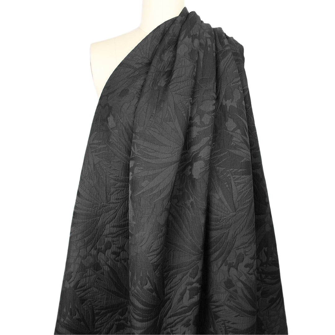 famous designer textured matelasse' flower brocade - black .5 yds