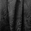 famous designer textured matelasse' flower brocade - black .5 yds