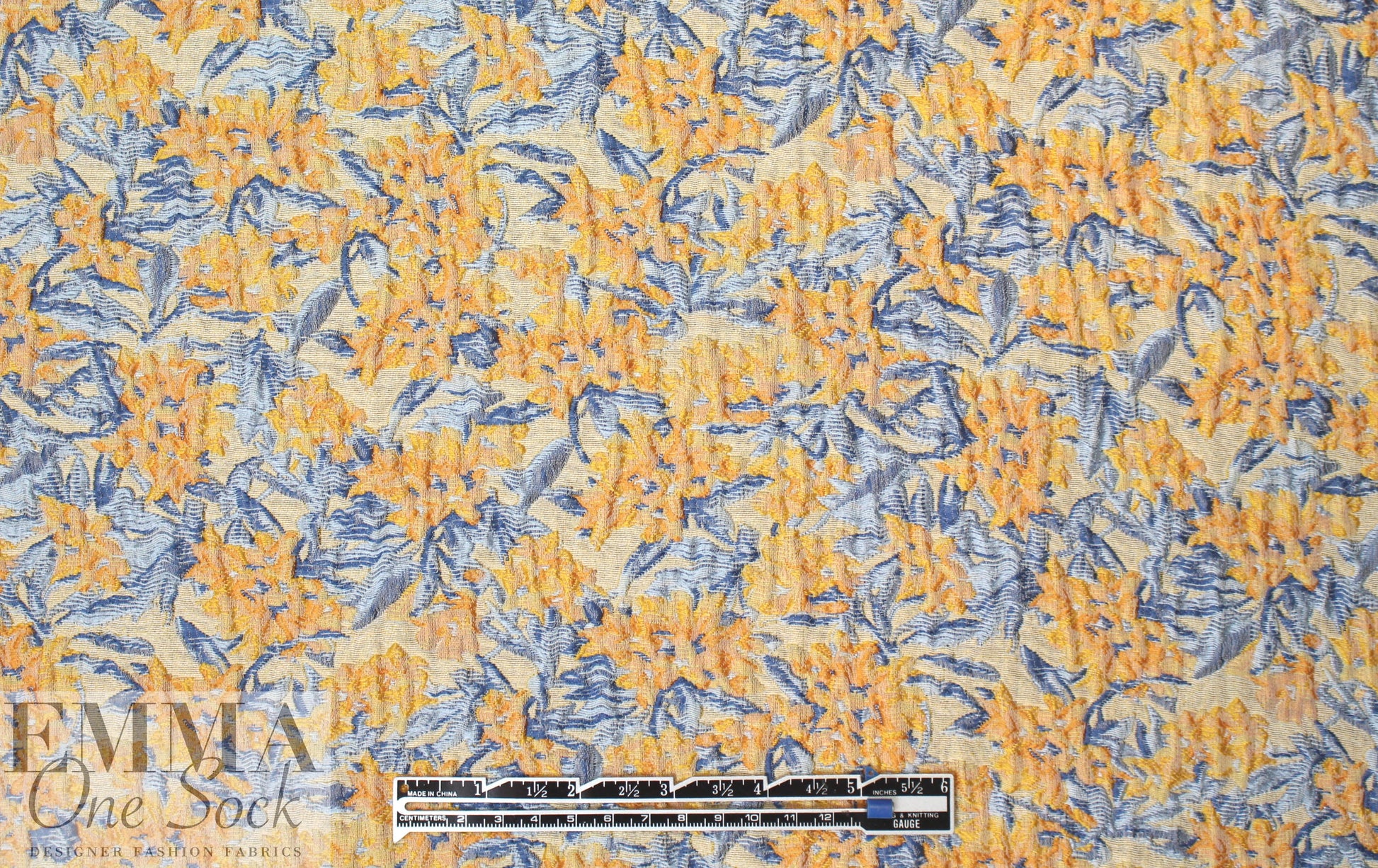 famous designer peach/french blue matelasse' brocade