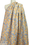 famous designer peach/french blue matelasse' brocade