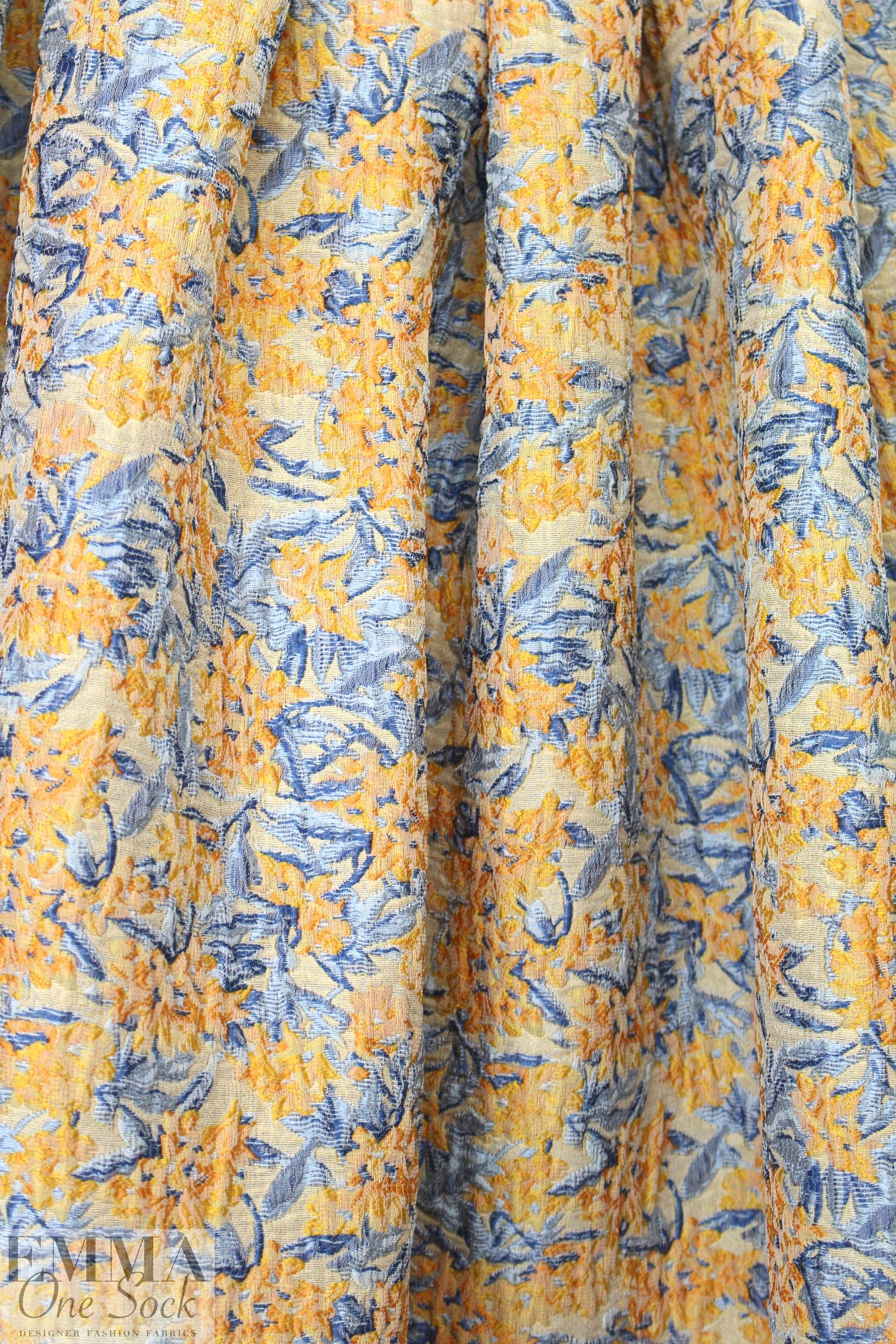 famous designer peach/french blue matelasse' brocade