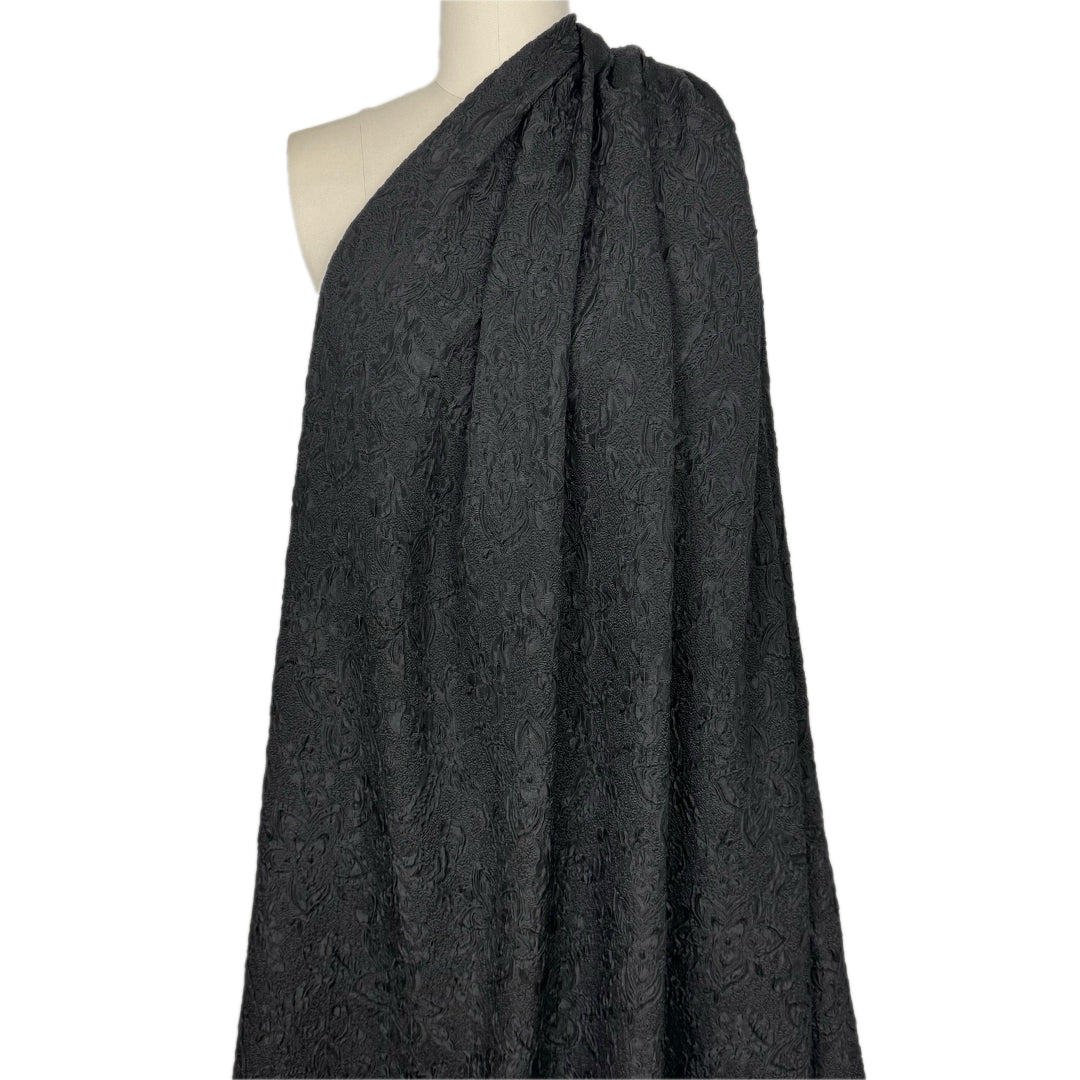 M. Lhui11ier textured matelasse' flower brocade - black .875 yds