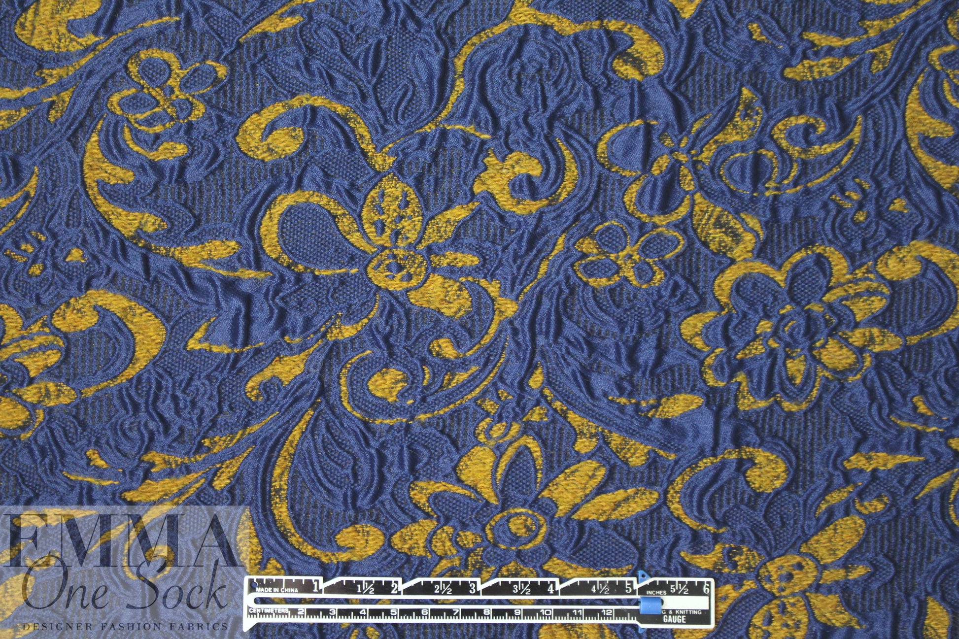 famous designer marine/dijon textured floral brocade