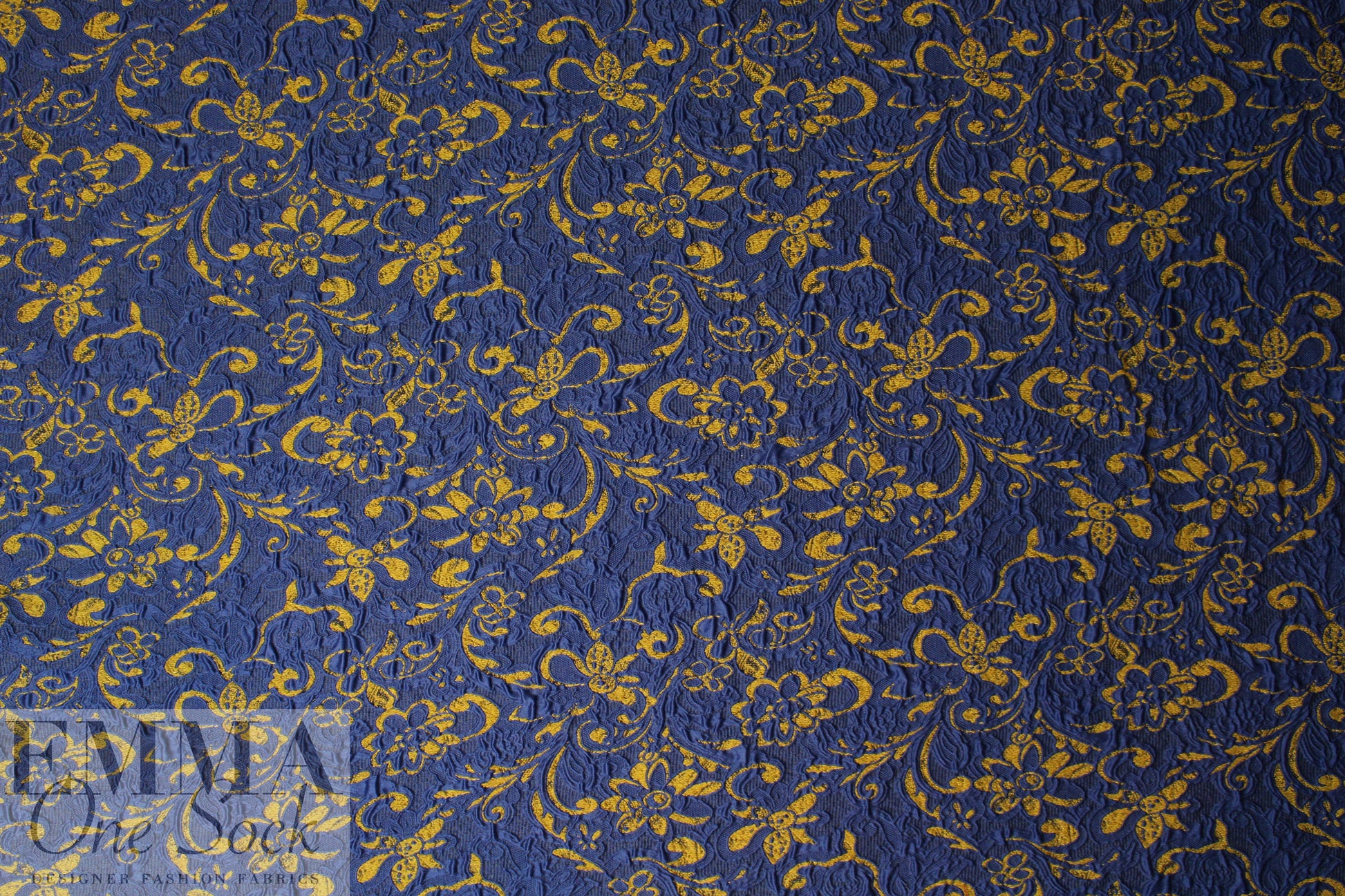 famous designer marine/dijon textured floral brocade