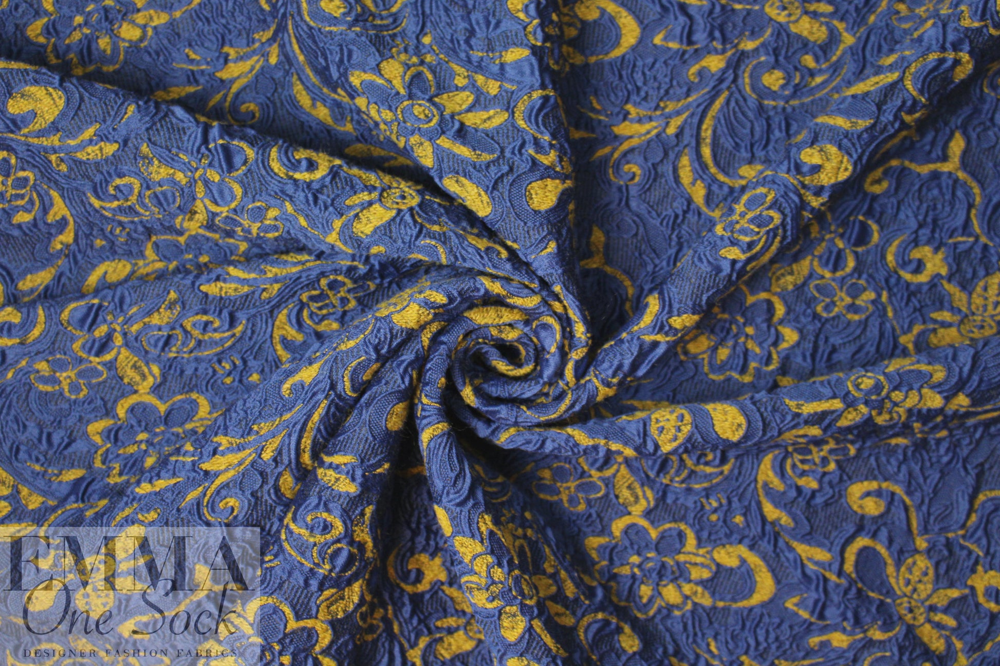 famous designer marine/dijon textured floral brocade