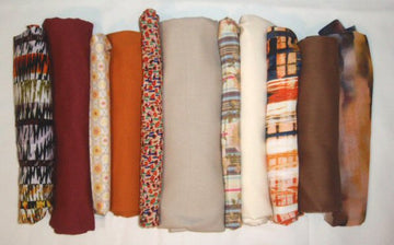 bundle, orange prints, 11 small cuts, 4 lbs