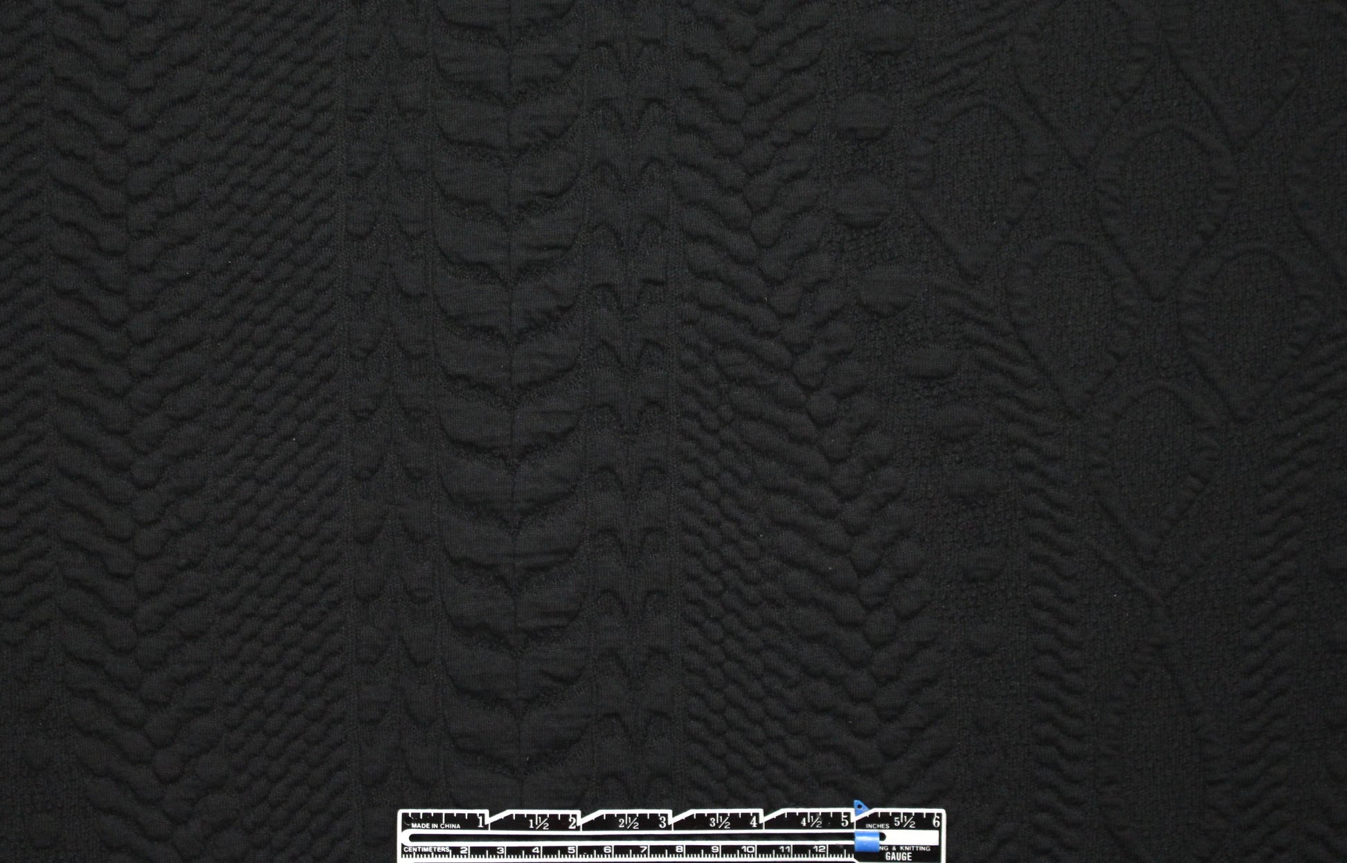 NY designer cable matelasse' knit - black 1.125 yds