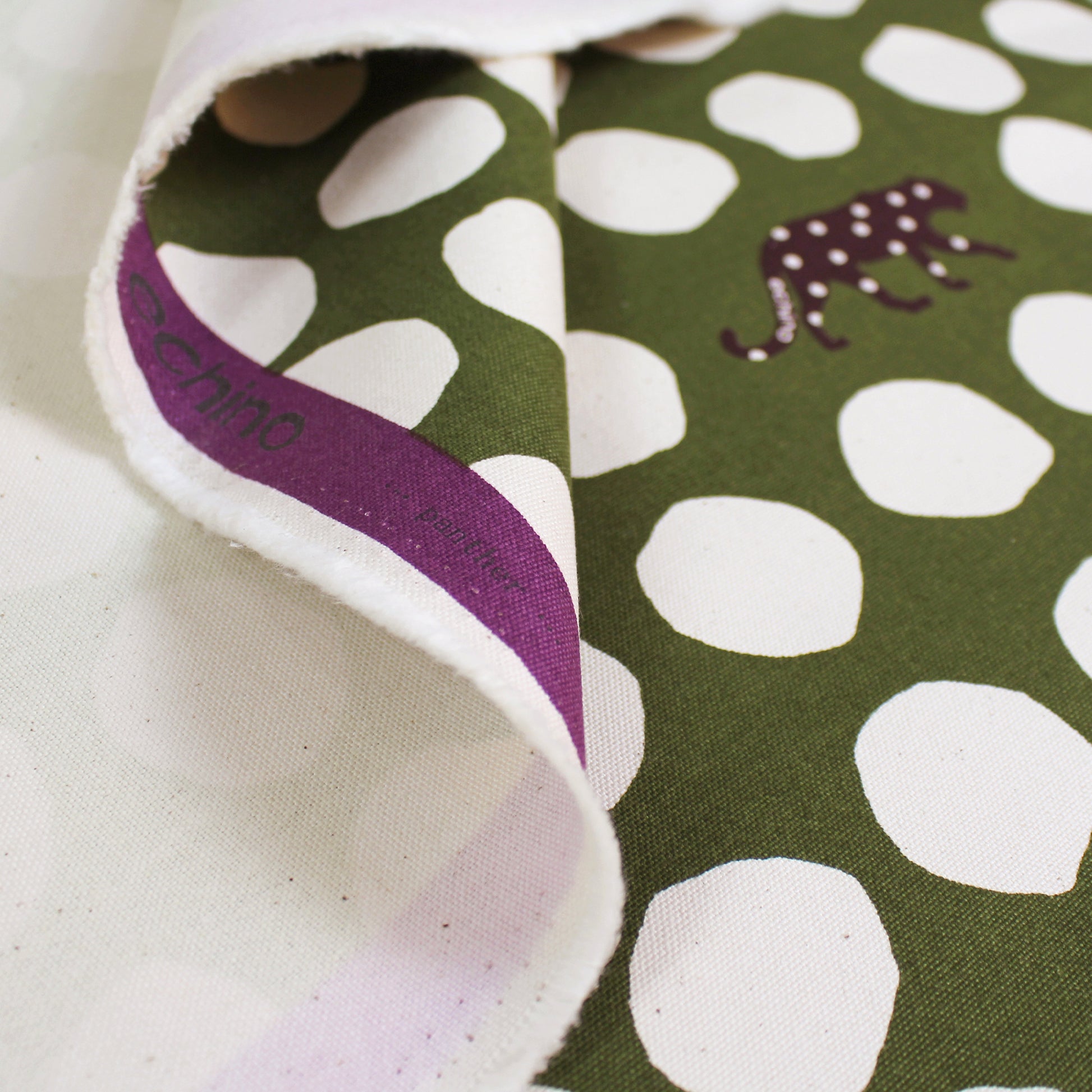 Japanese 'spotted panther' by Kokka cotton canvas - olive