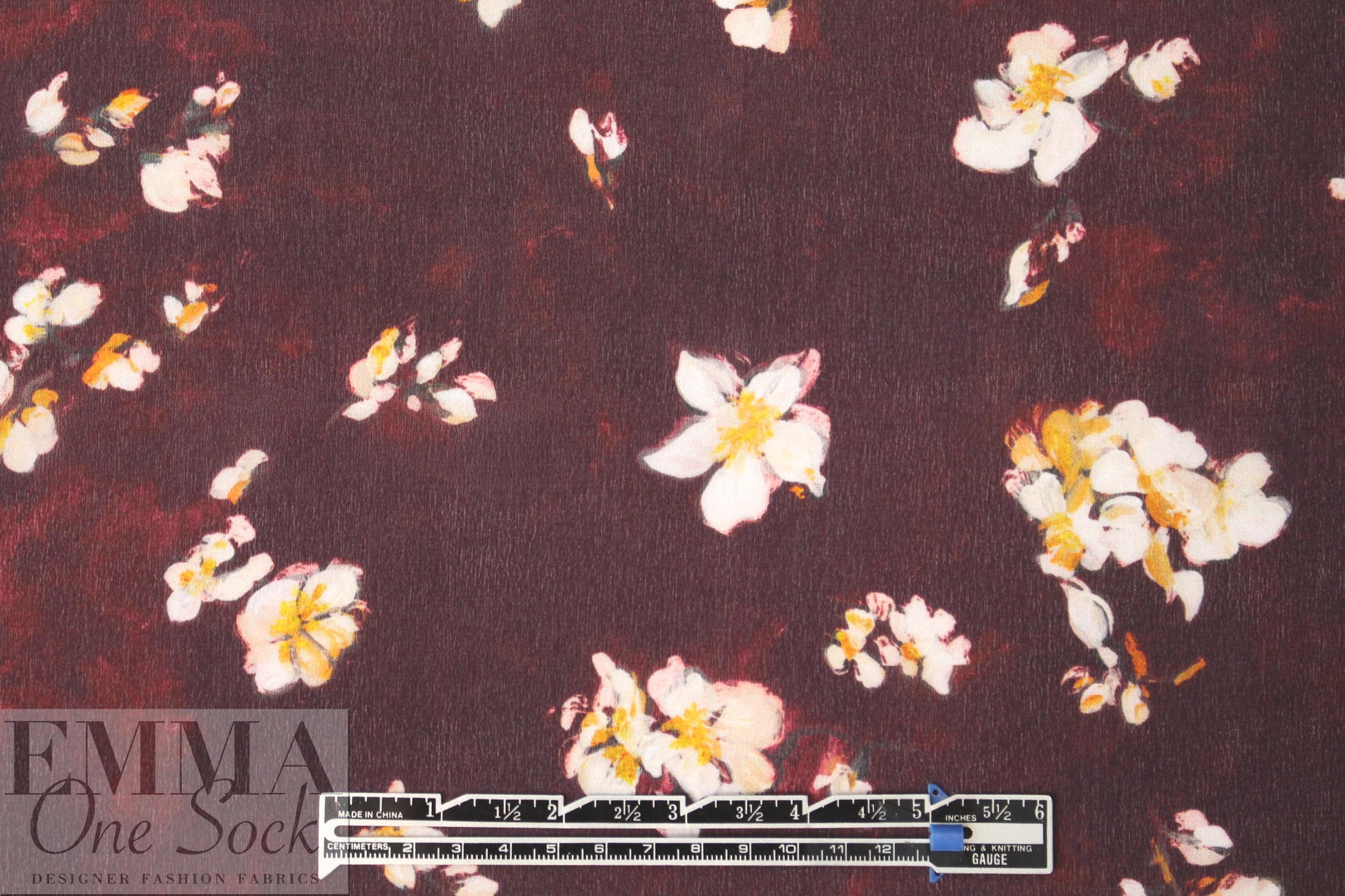 Caroline C0nstas blossoms on burgundy silk satin chiffon