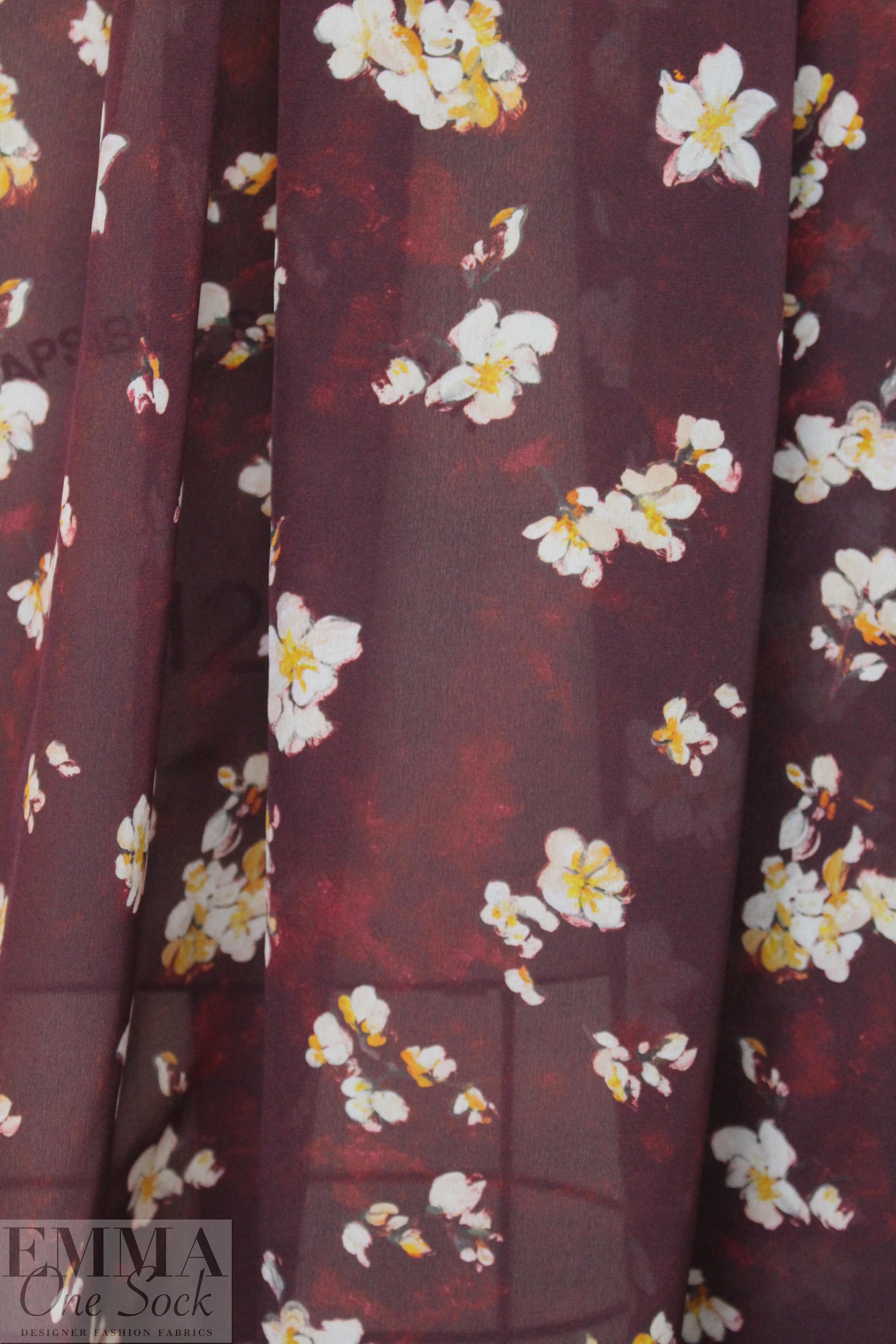 Caroline C0nstas blossoms on burgundy silk satin chiffon