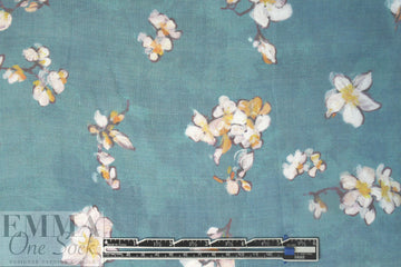 Caroline C0nstas blossoms on teal silk chiffon