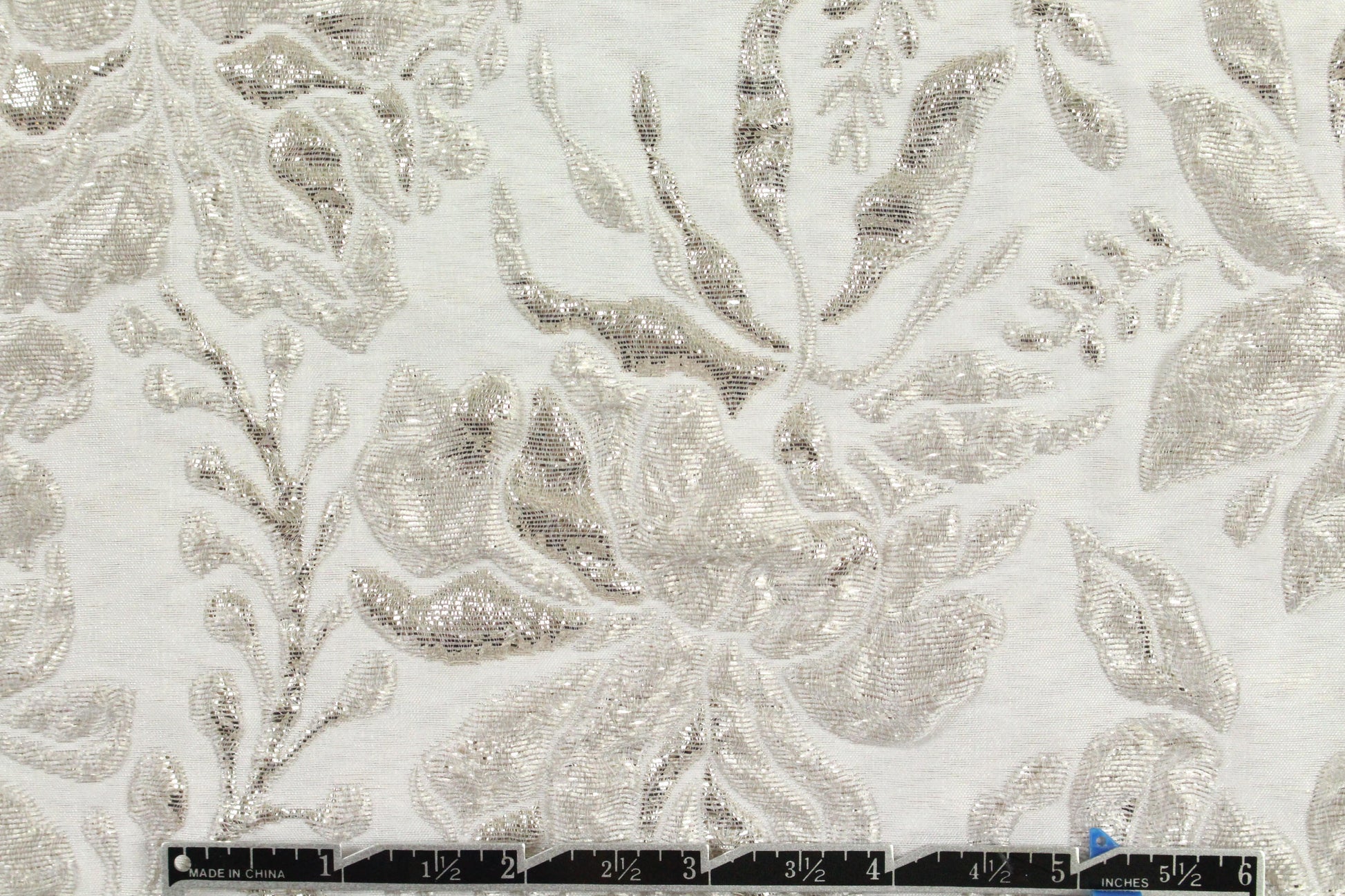 Carmen Marc Va1vo texture floral cloque' - silver .875 yds