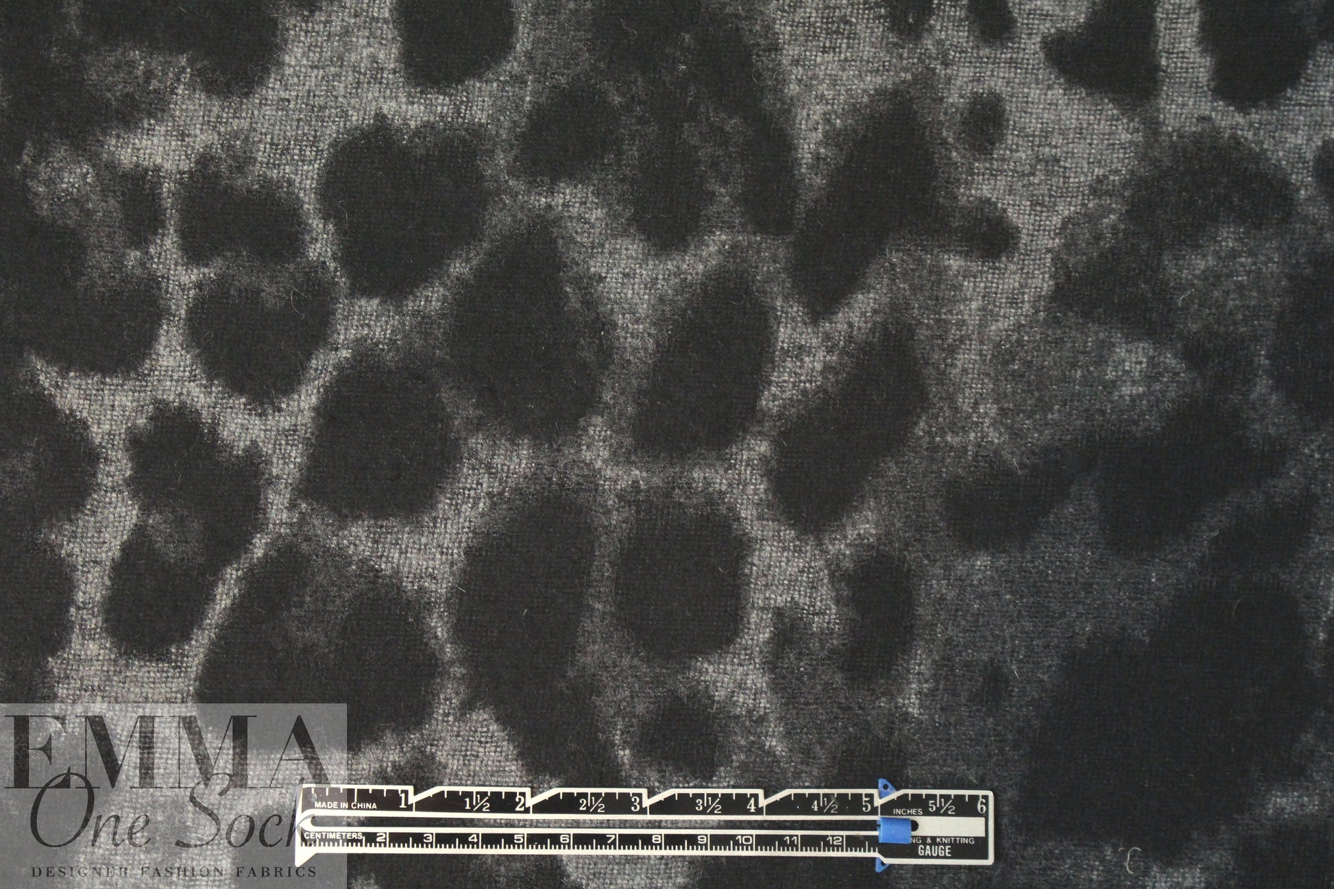 Italian stylized jacquard animal design wool blend coating .875 yds