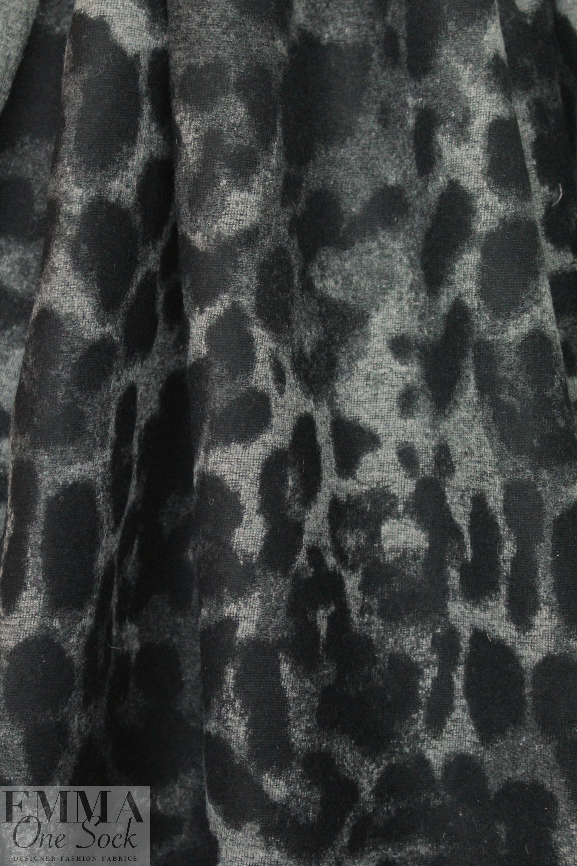 Italian stylized jacquard animal design wool blend coating .875 yds