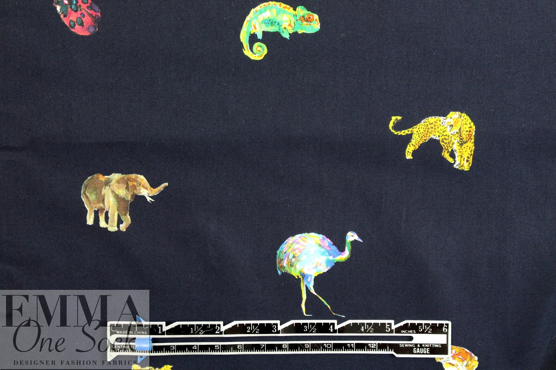 Italian colorful critters on midnight cotton shirting