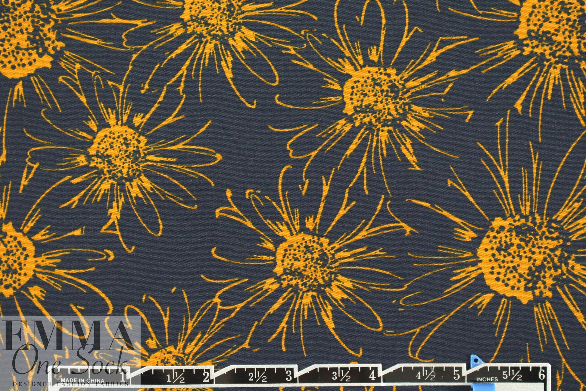 Italian cinnamon/navy daisy print cotton woven 2 yd