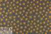Italian cinnamon/navy daisy print cotton woven 2 yd